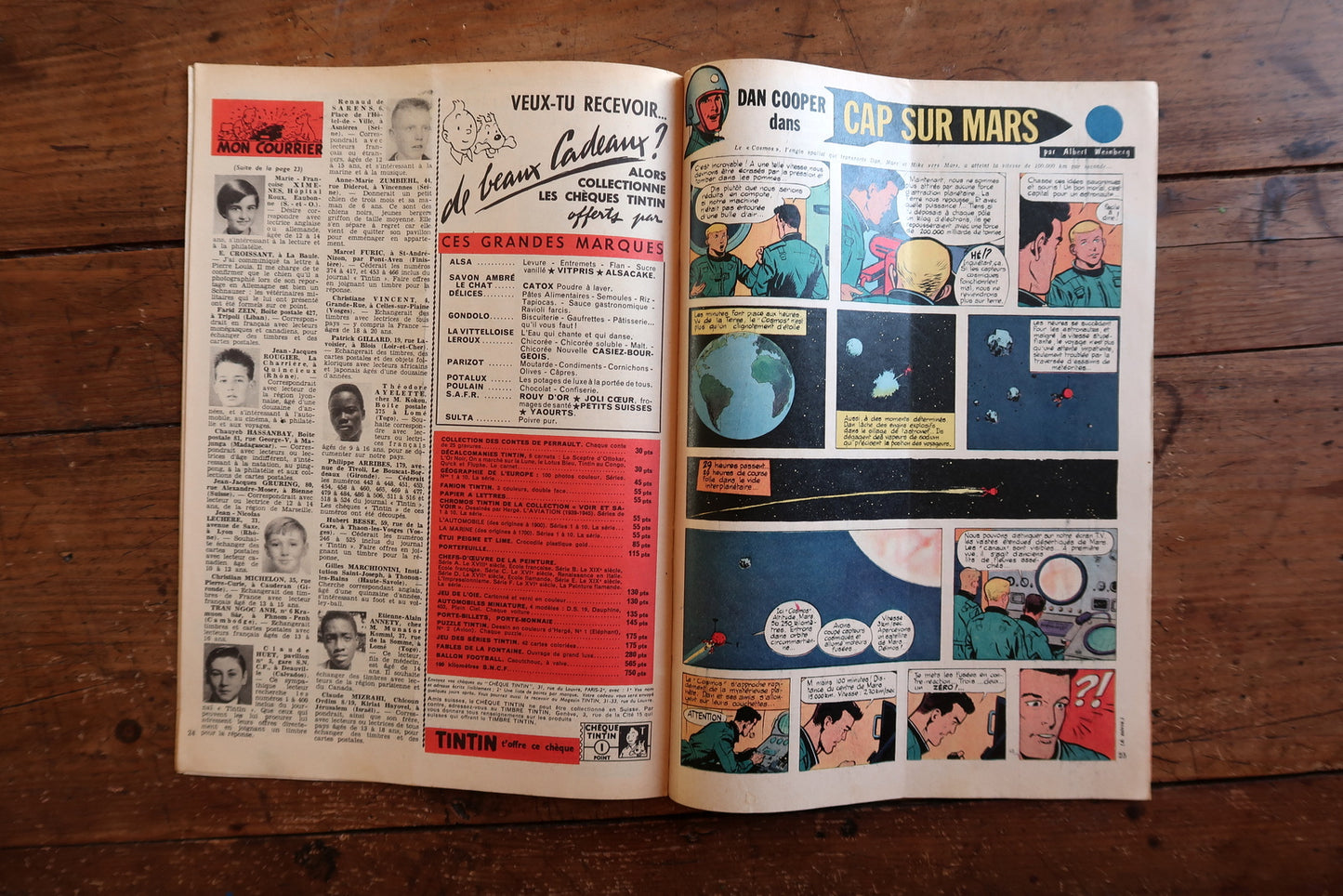 Back cover and spine detail of a July 23, 1959 Tintin comic magazine in good vintage condition with light wear to edges and corners, staples intact.

