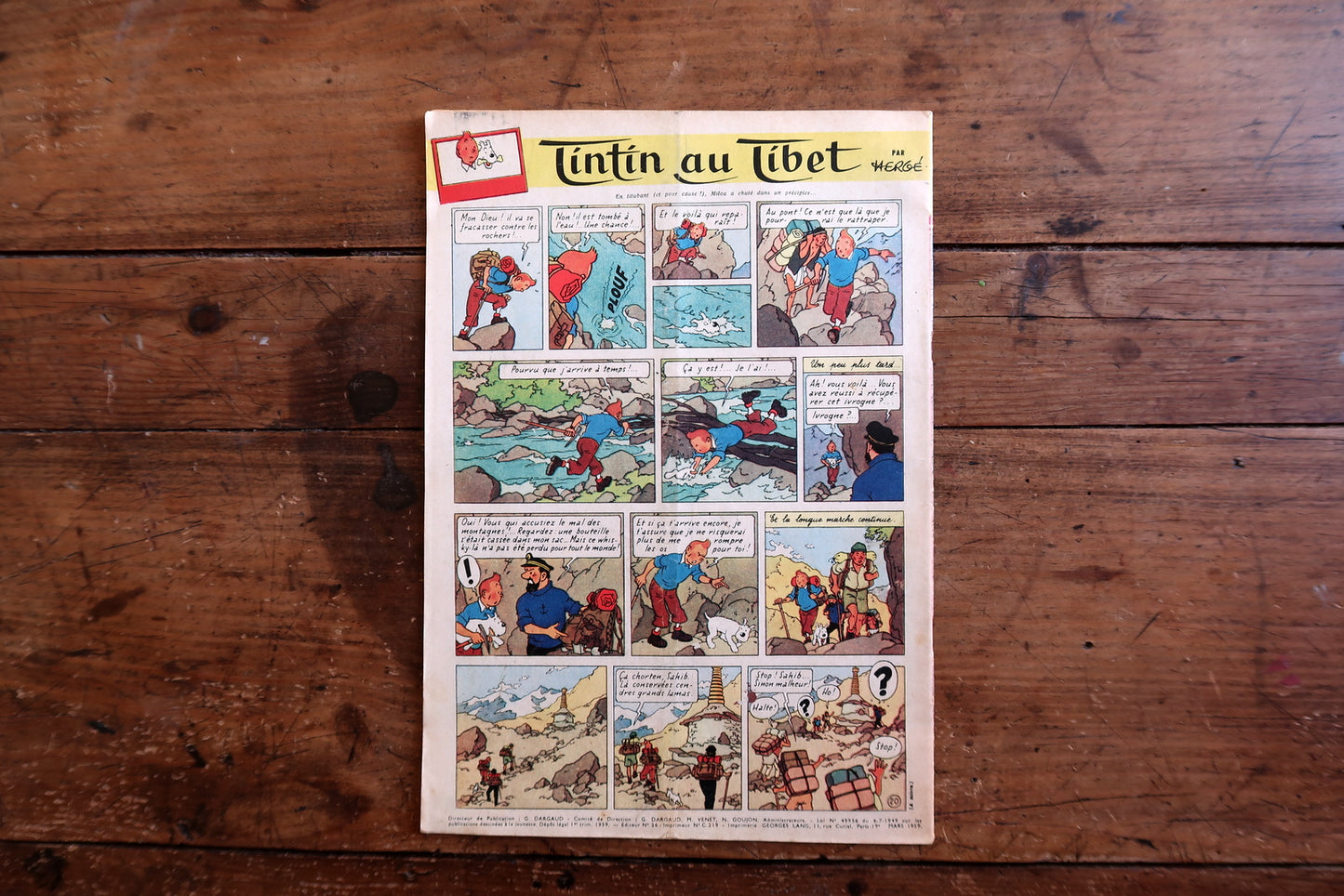 Collectible 1959 Le Journal de Tintin magazine from the golden age of Franco-Belgian comics, featuring a Jean Graton racing cover and interior pages including Tintin au Tibet by Hergé.

