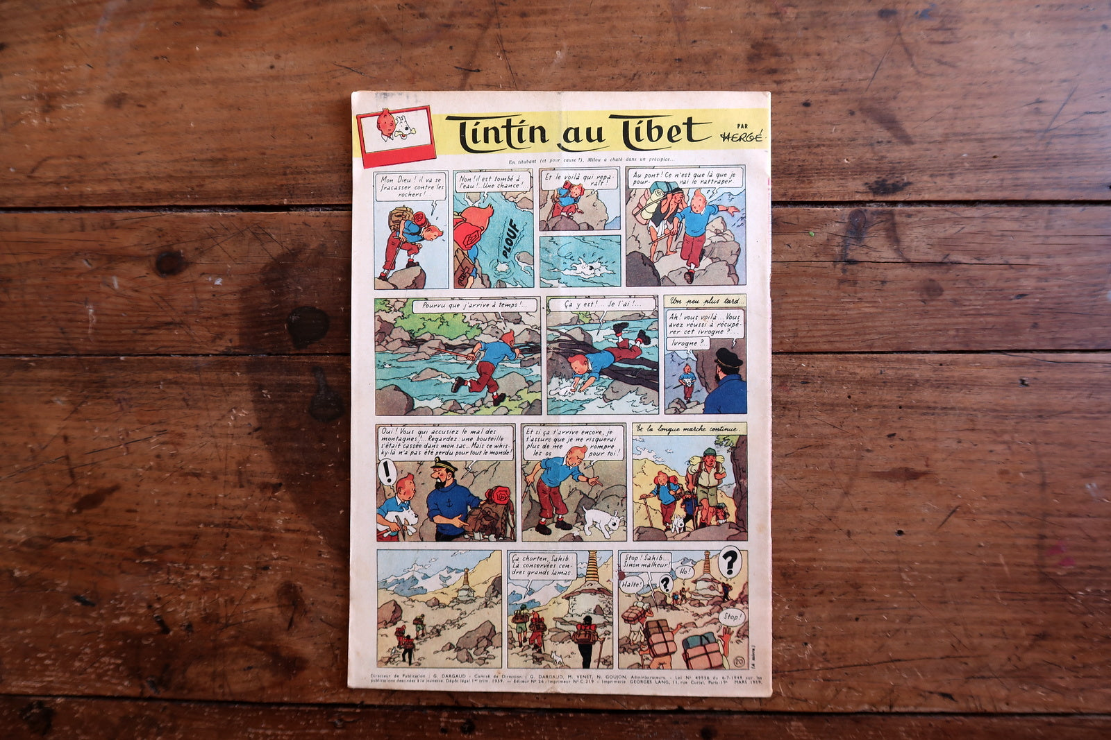 Collectible 1959 Le Journal de Tintin magazine from the golden age of Franco-Belgian comics, featuring a Jean Graton racing cover and interior pages including Tintin au Tibet by Hergé.

