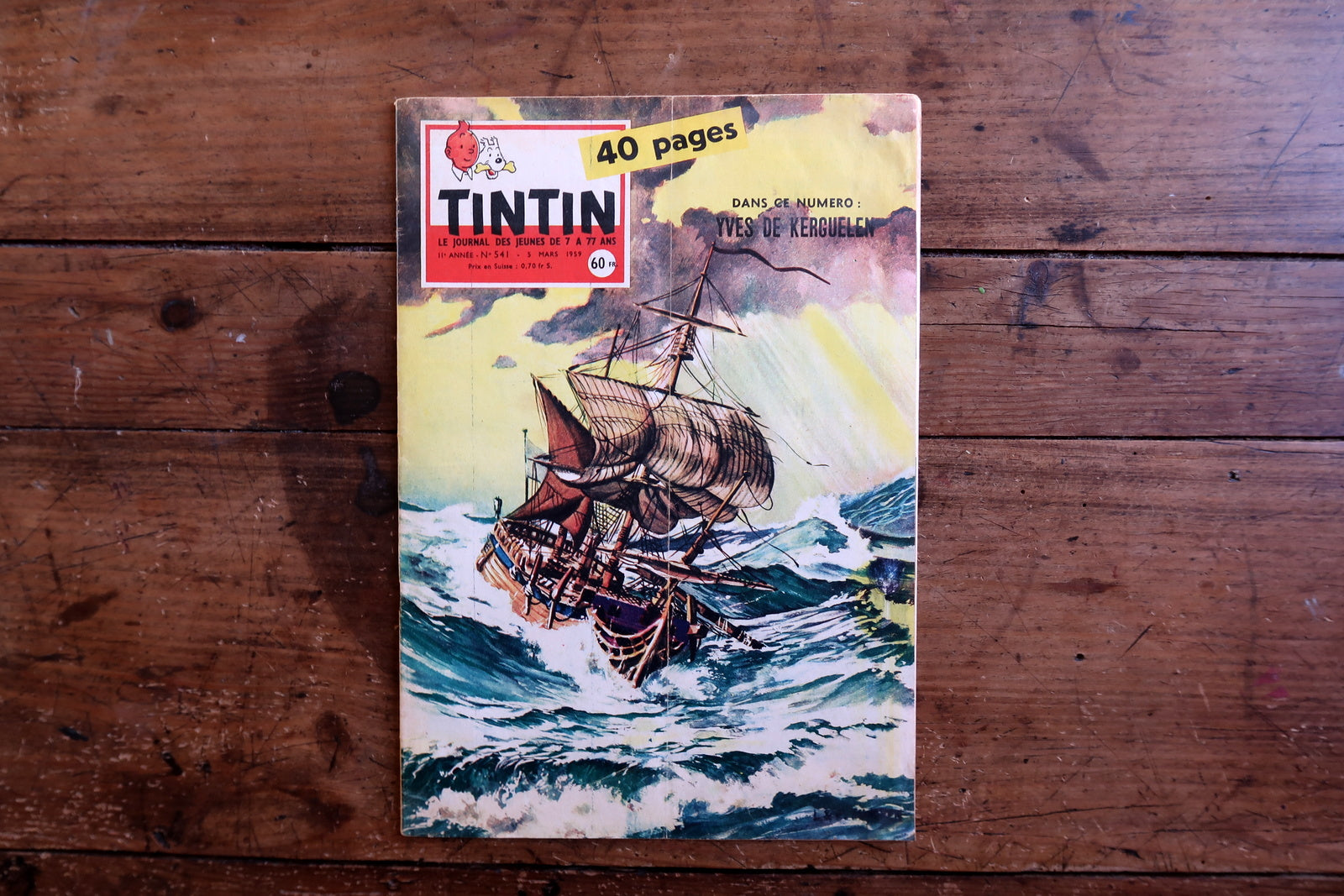 Vintage March 5, 1959 Tintin magazine issue No. 541 displayed flat, measuring approximately 8.3 x 11.8 inches, with French language text and bande dessinée artwork.

