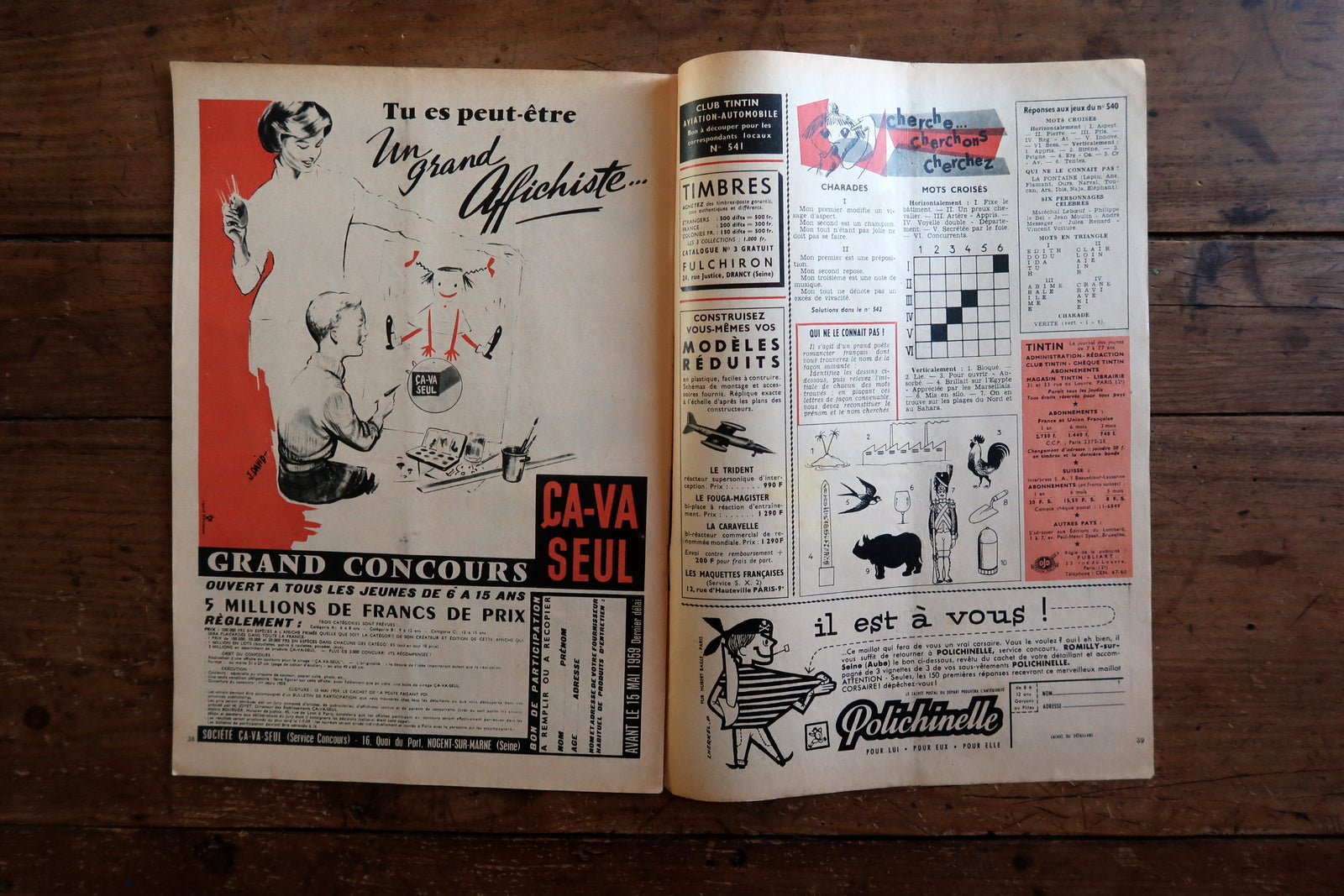 Close-up of the cover art on a 1959 French Tintin comic book magazine showing a ship struggling against stormy seas, with the iconic Tintin header and issue details.

