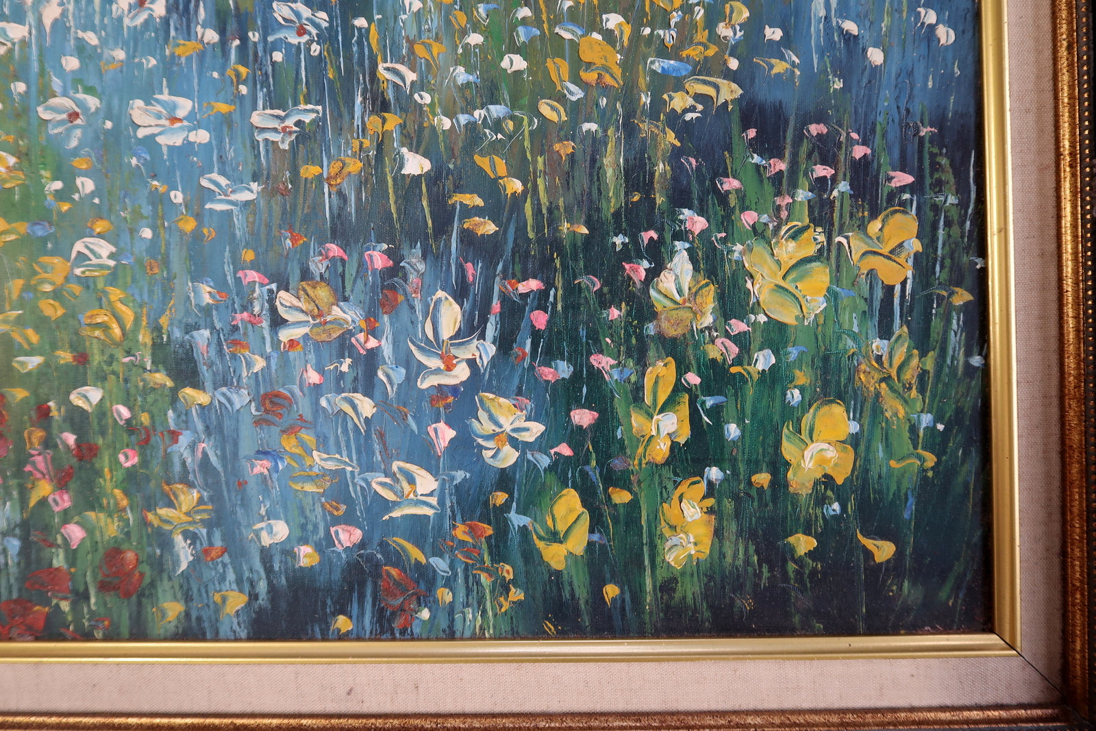 Vintage 20th century oil painting in good overall condition, with expressive brushwork capturing light and movement in a mother and child floral meadow scene.

