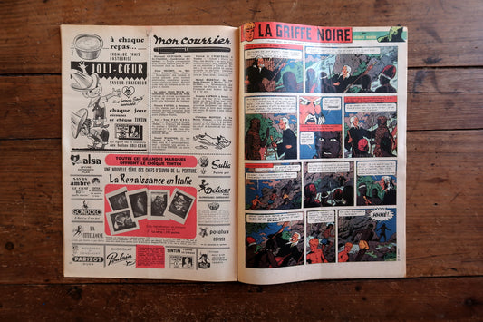 Back cover and spine detail of the 1959 Tintin New Year magazine issue in good vintage condition with light wear, minor creases, and edge wear consistent with age.

