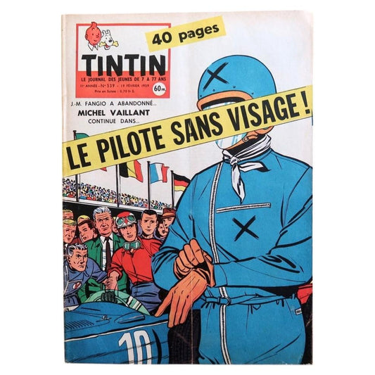 Front cover of Tintin magazine N°539 from February 19, 1959, featuring the dramatic debut of Michel Vaillant in "Le Pilote Sans Visage" (The Faceless Pilot) – a mysterious blue-suited racing driver with concealed face standing beside car number 10 under international flags.

