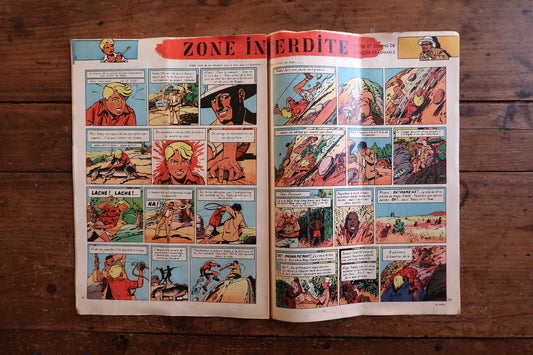 Back cover of a 1958 Tintin comic magazine showing the full-page color S.O.S. Météores by E.P. Jacobs (Blake & Mortimer) – a tense motorcycle pursuit through a snow-blanketed Paris in meticulous ligne claire style.

