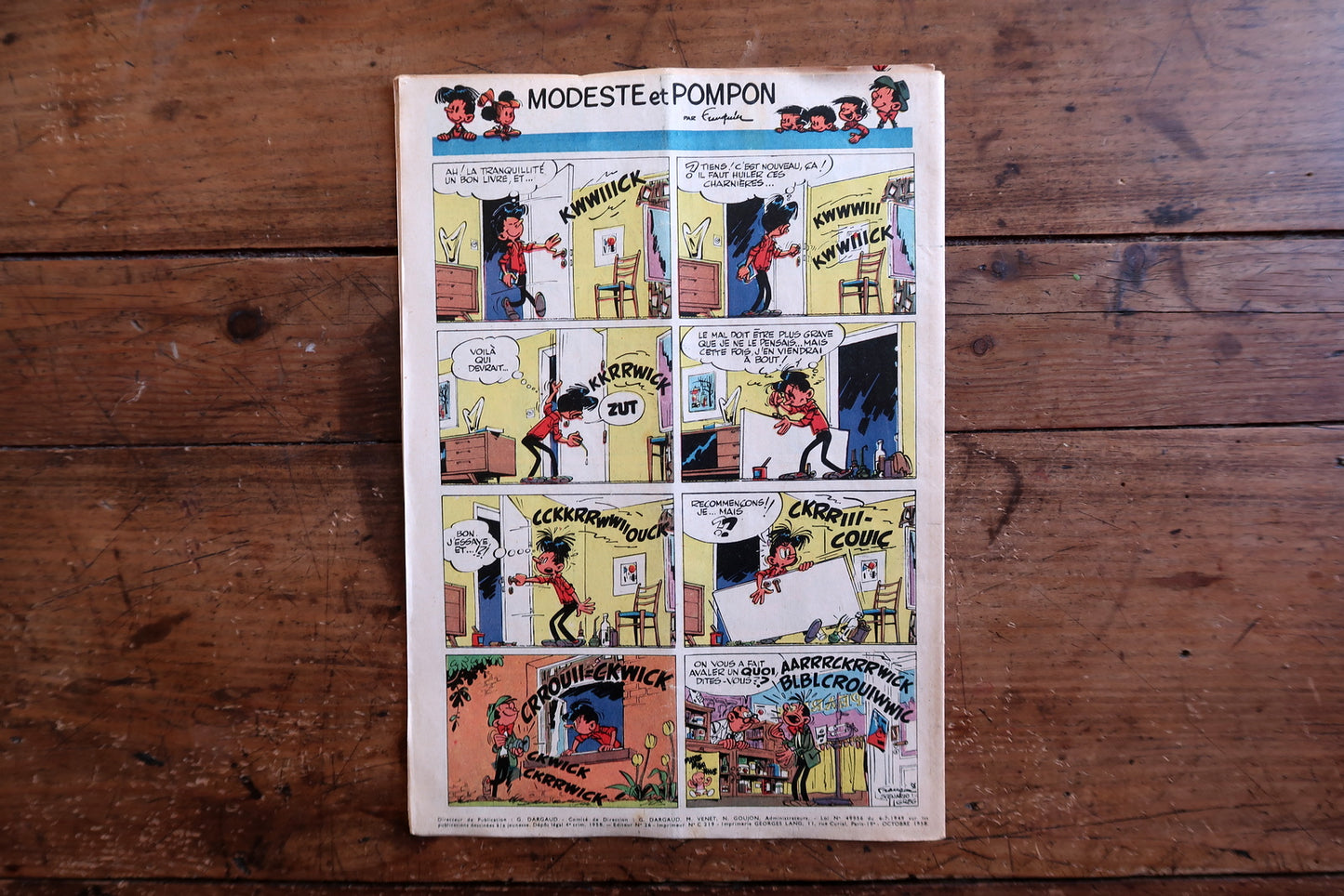Collectible 1958 Journal de Tintin featuring an energetic "Anthracite S'Evade!" cover, interior content including a full-page color Modeste et Pompon by Franquin on the back cover, and Jari dans la Tourmente by Raymond Reding.

