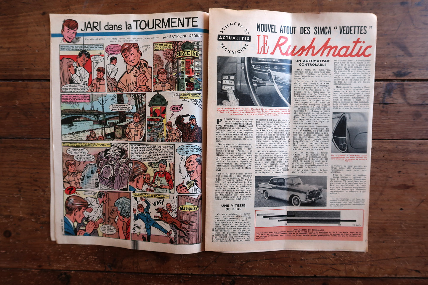 Open view of original Tintin magazine N°521 showing interior pages including Raymond Reding's Jari dans la Tourmente (cinematic Paris sequence with Eiffel Tower), Edouard Aïdans' Robert-Louis Stevenson biographical strip, and François Craenhals' Zone Interdite.

