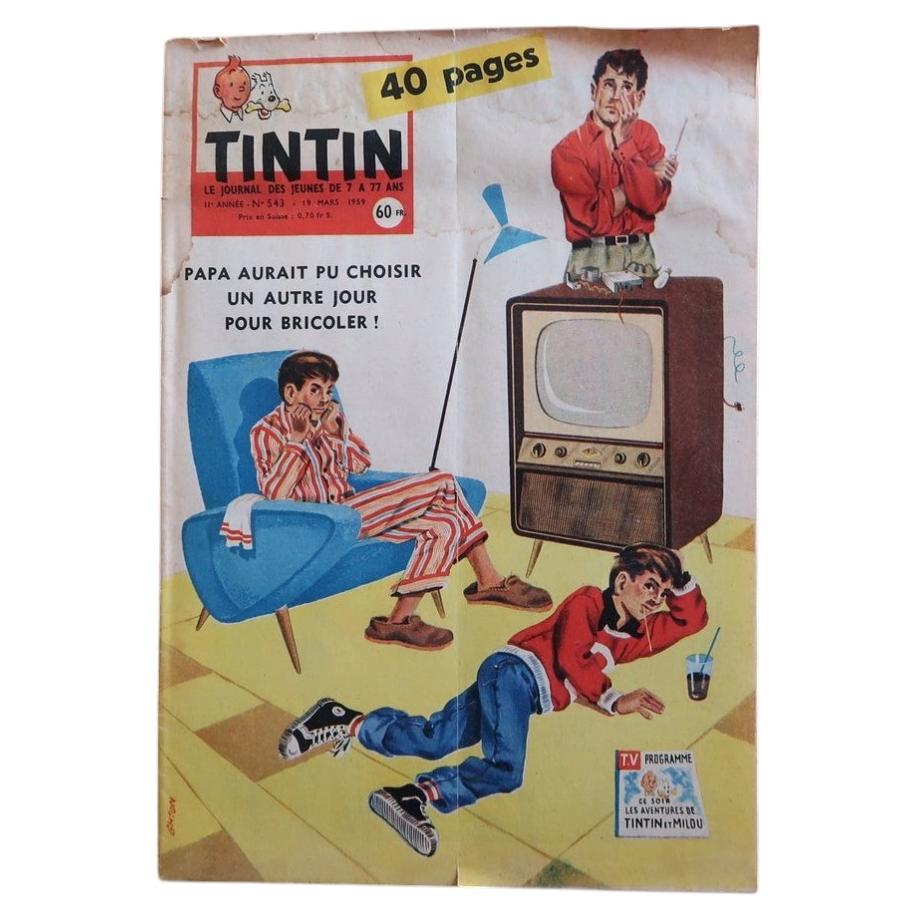 Front cover of Journal Tintin N°542 from March 18, 1959, featuring a masterpiece of late-1950s graphic humor: a hapless father stands atop a wooden-cabinet television set with tools in hand while his household falls apart around him, including two sons sprawled across a yellow checkerboard floor and curled in a powder-blue Scandinavian armchair, with the caption "Papa aurait pu choisir un autre jour pour bricoler!"

