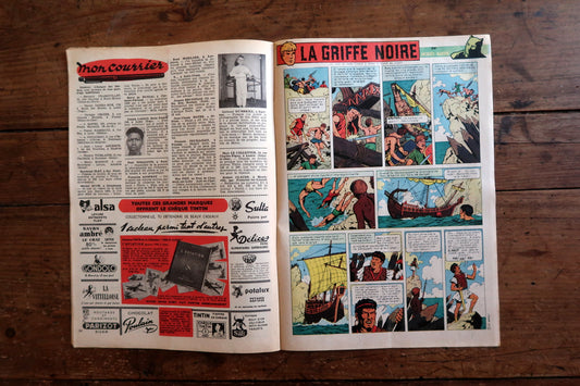 Close-up of the cover art on a 1959 French-Belgian Tintin comic magazine showing a dramatic bird villain in red coat and top hat with an accomplice holding a detonator box and a floating red balloon, in bold graphic style.

