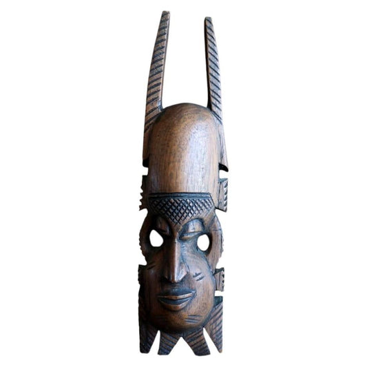 African hardwood mask — carved mask with crown‑style crest and facial scarification

