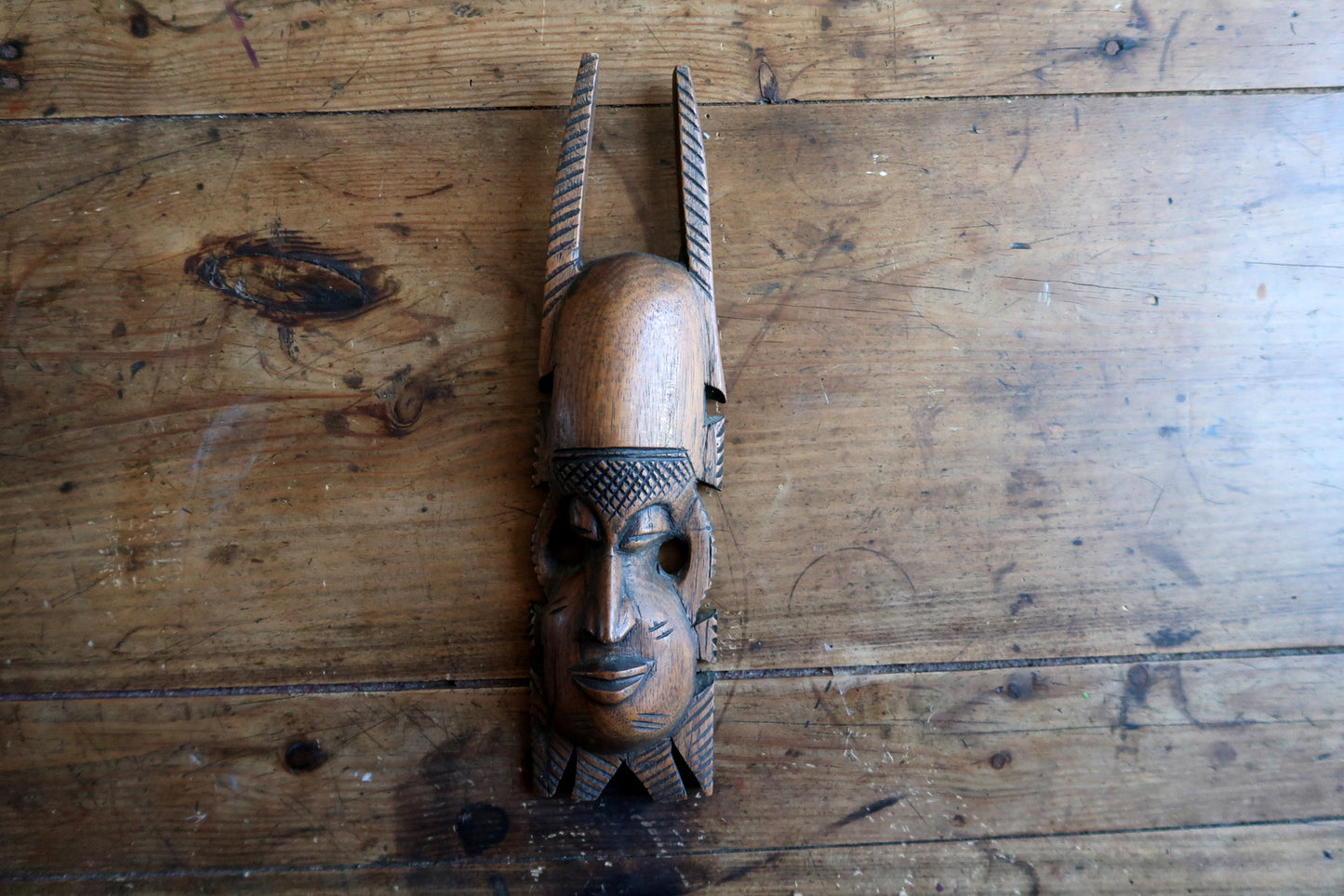 Côte d’Ivoire tribal mask — hardwood carving with raised crest and refined features

