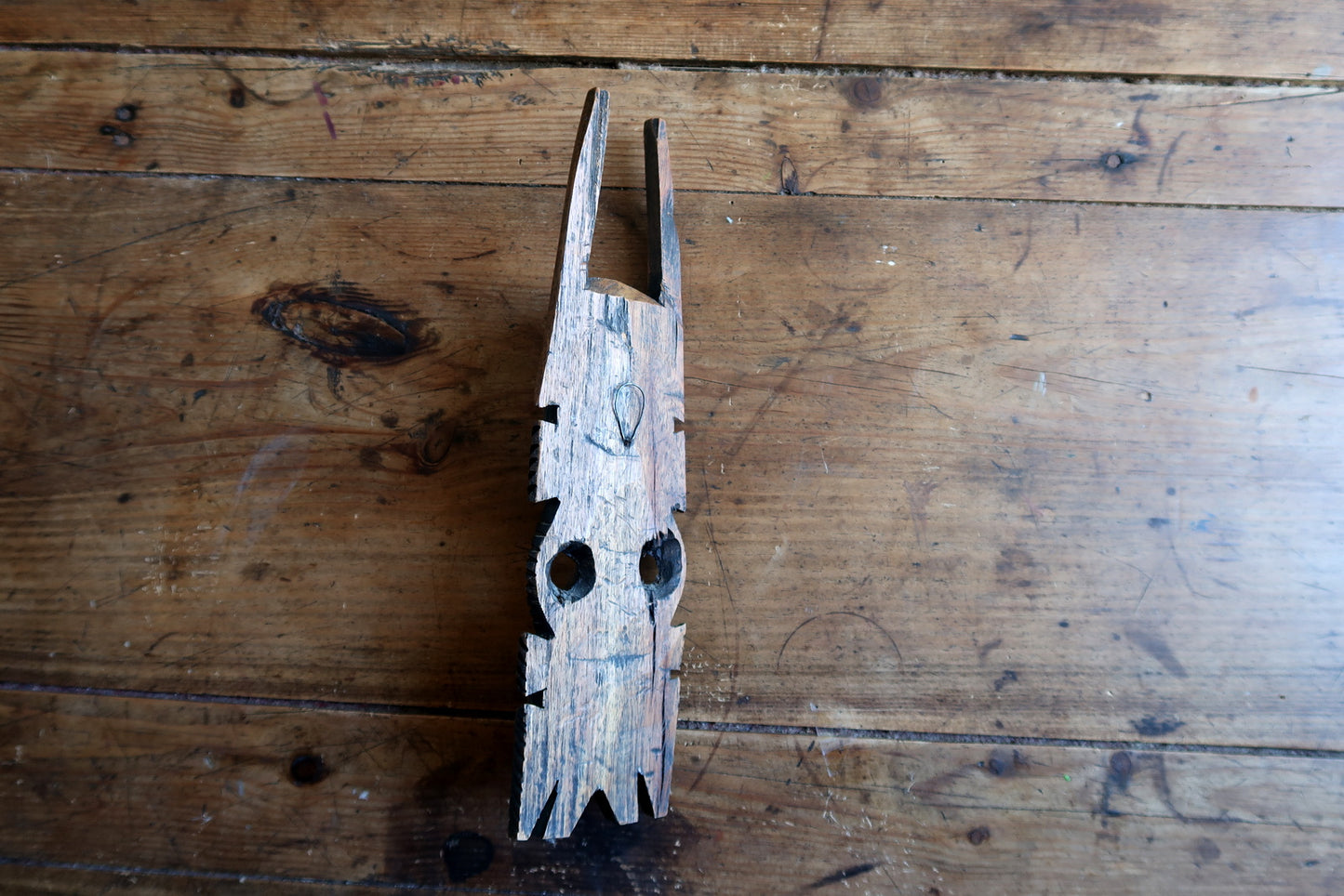 Ivory Coast ceremonial mask — tall crown crest and detailed carving

