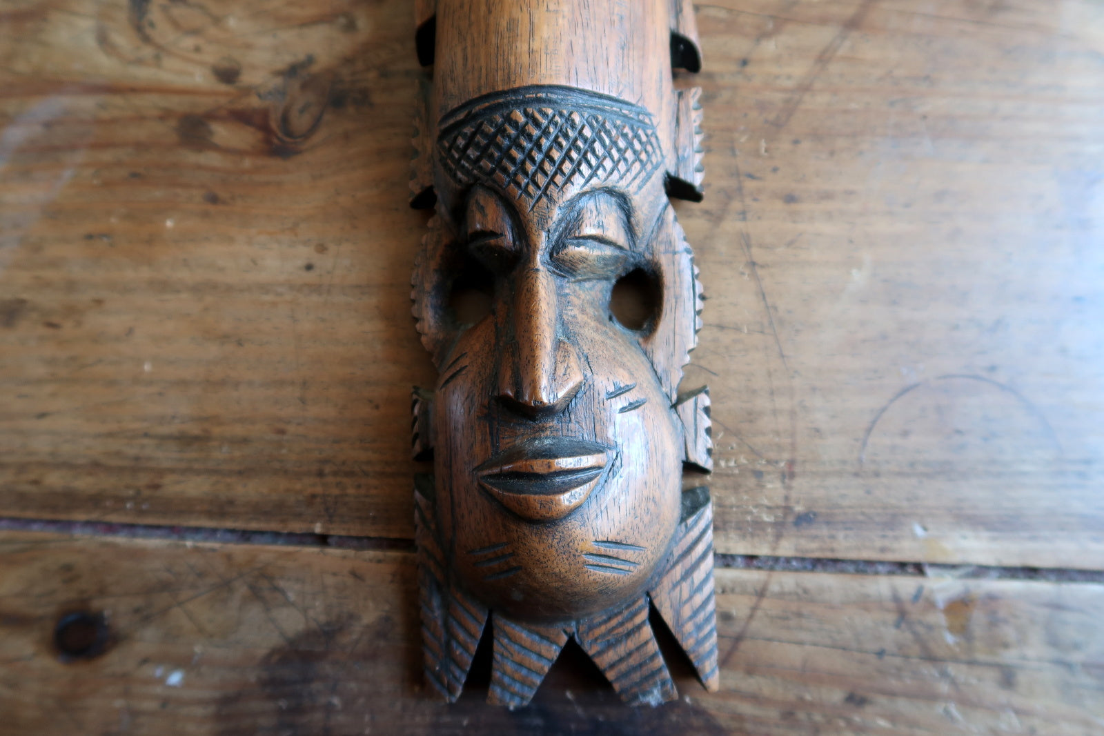 African wall mask — decorative hardwood mask with traditional markings

