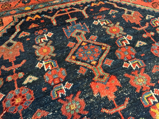 Handmade Persian Hamadan rug featuring deep red and navy hues

