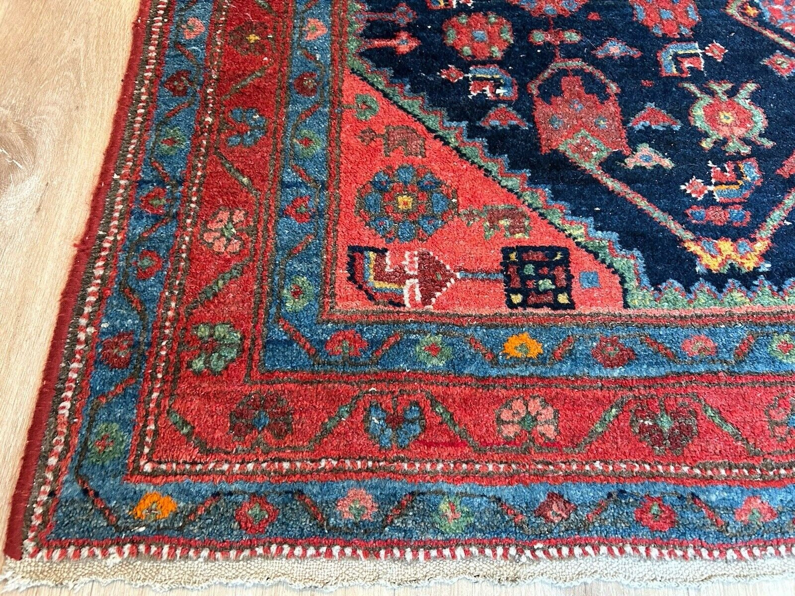 Persian wool rug with delicate ivory and earthy-toned detailing

