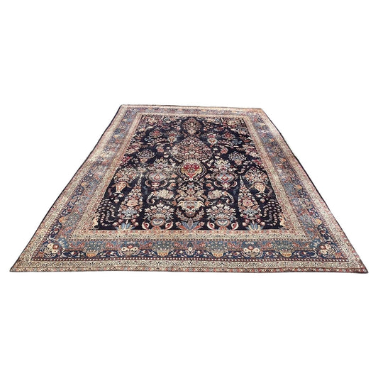 Antique Persian Kashan rug with central medallion design


