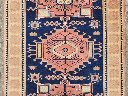 1970s Turkish wool rug with geometric central medallion

