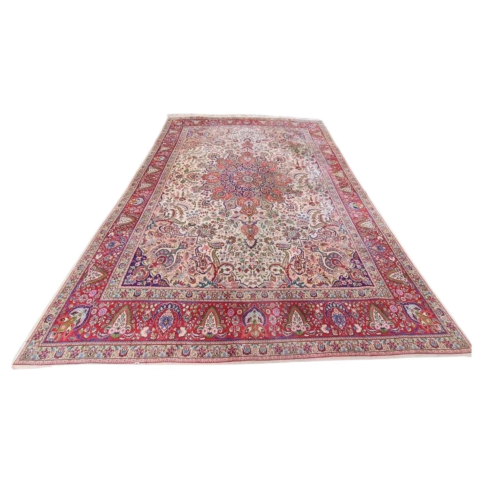 Central beige medallion on Persian Tabriz rug

