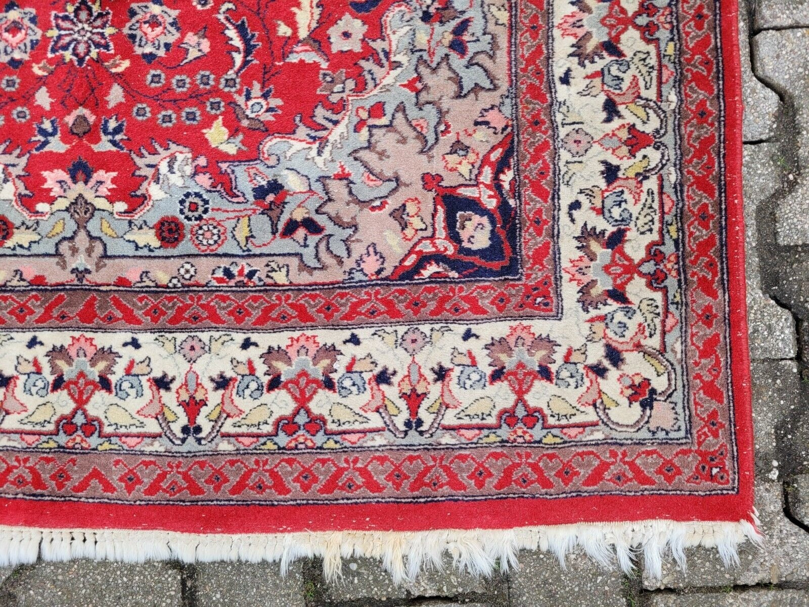 High-quality wool pile with vibrant color retention.
