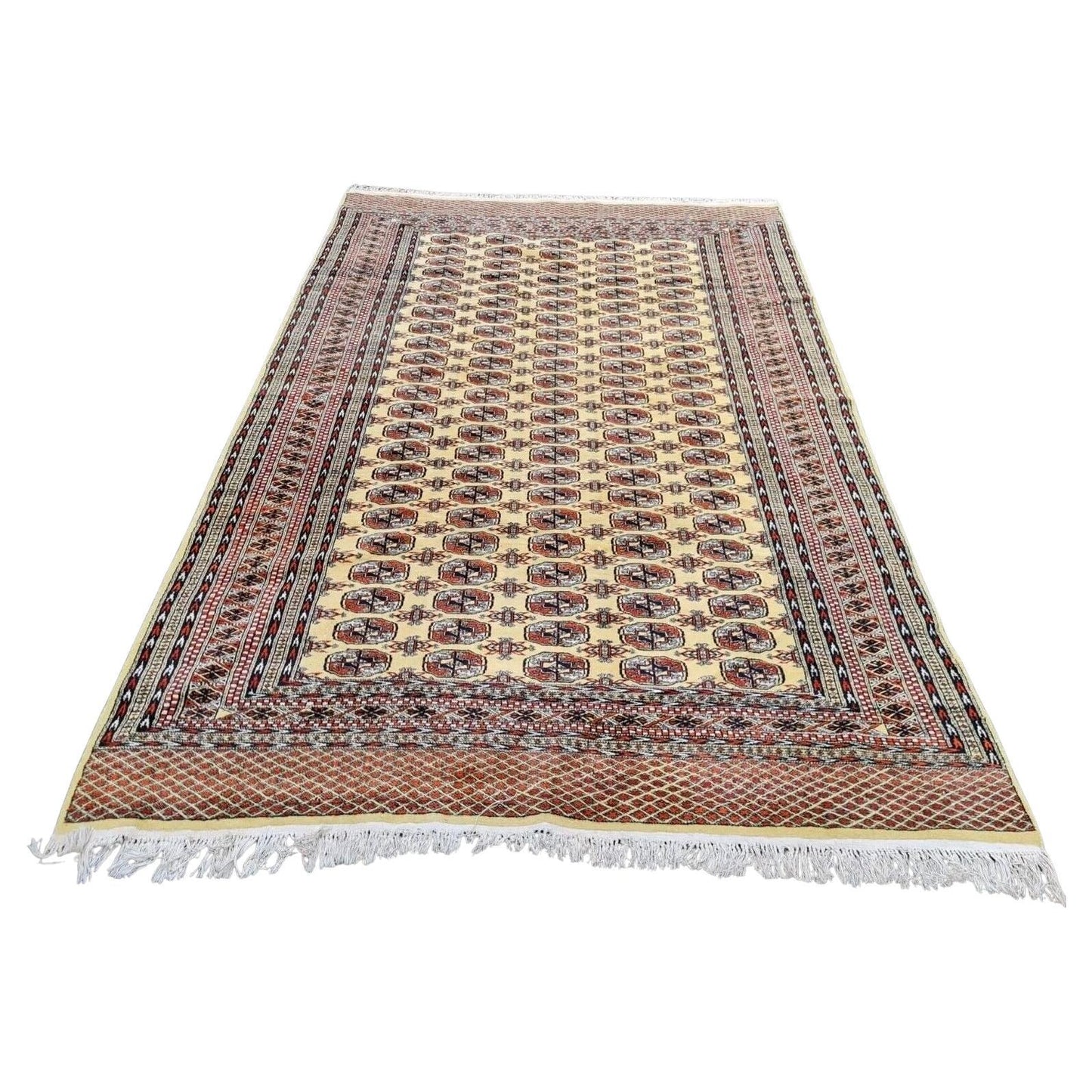 Handmade Uzbek Bukhara rug with gul motifs

