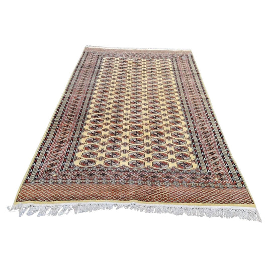 Handmade Uzbek Bukhara rug with gul motifs

