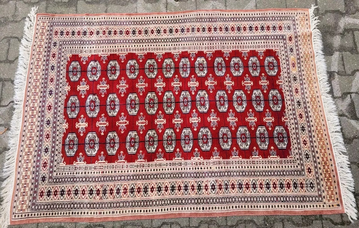 Geometric border detail of hand-knotted rug

