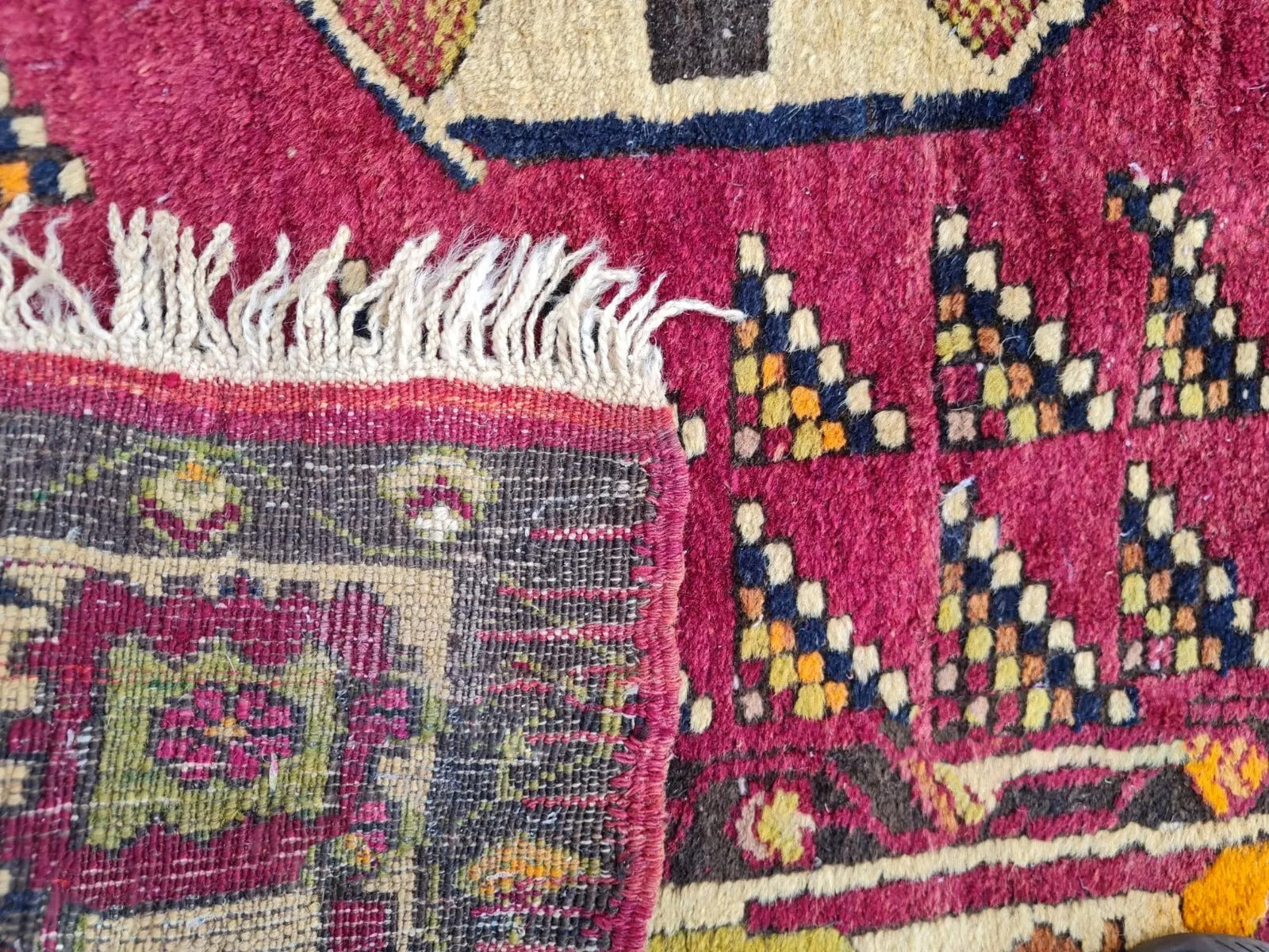 Tribal border design with floral and geometric patterns

