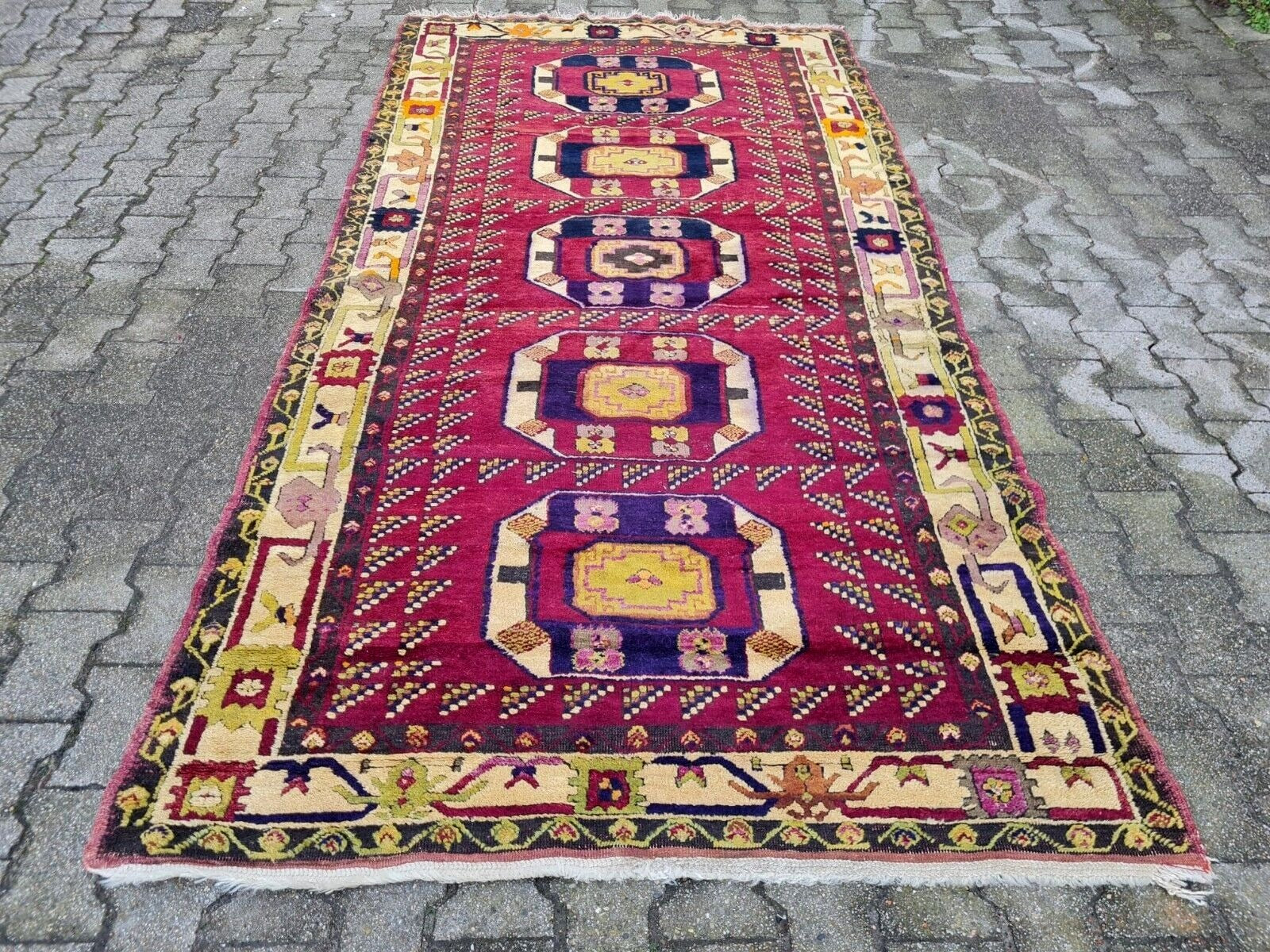 Red and purple motif on vintage Turkish carpet

