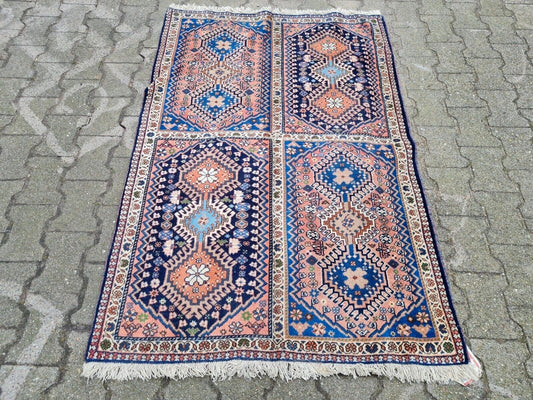 Handmade 1960s tribal wool rug from Persia

