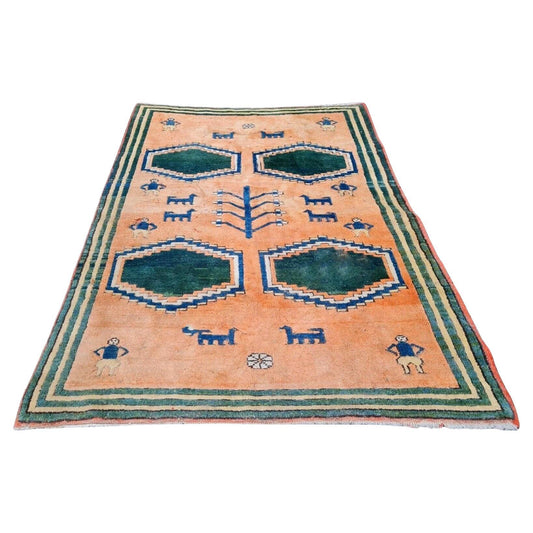 Vintage Persian Gabbeh rug with orange and teal design

