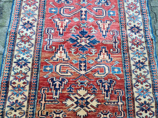 Handmade Caucasian Kazak rug 1990s tribal style

