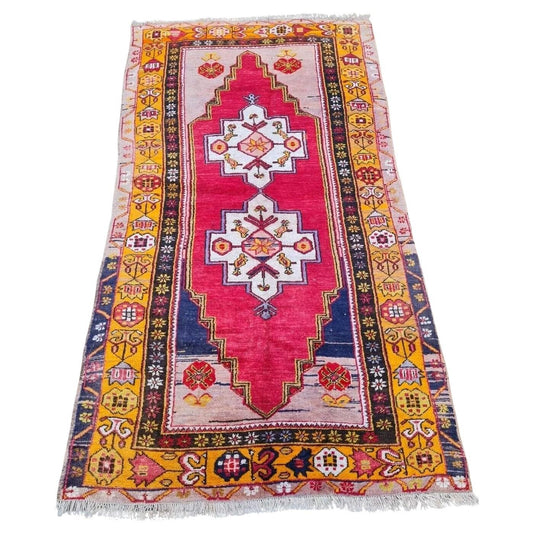 close-up of geometric medallion on antique Anatolian rug