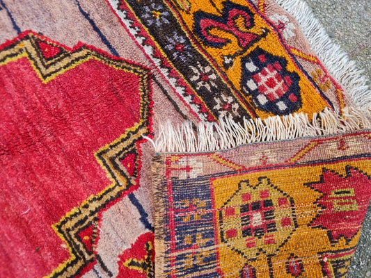 hand-knotted Turkish rug with terracotta center