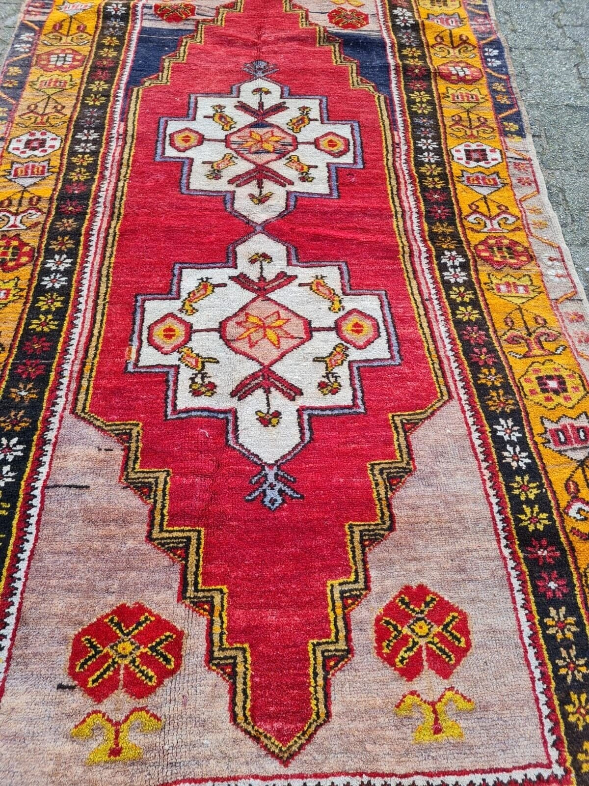  1930s Turkish rug with folk art patterns