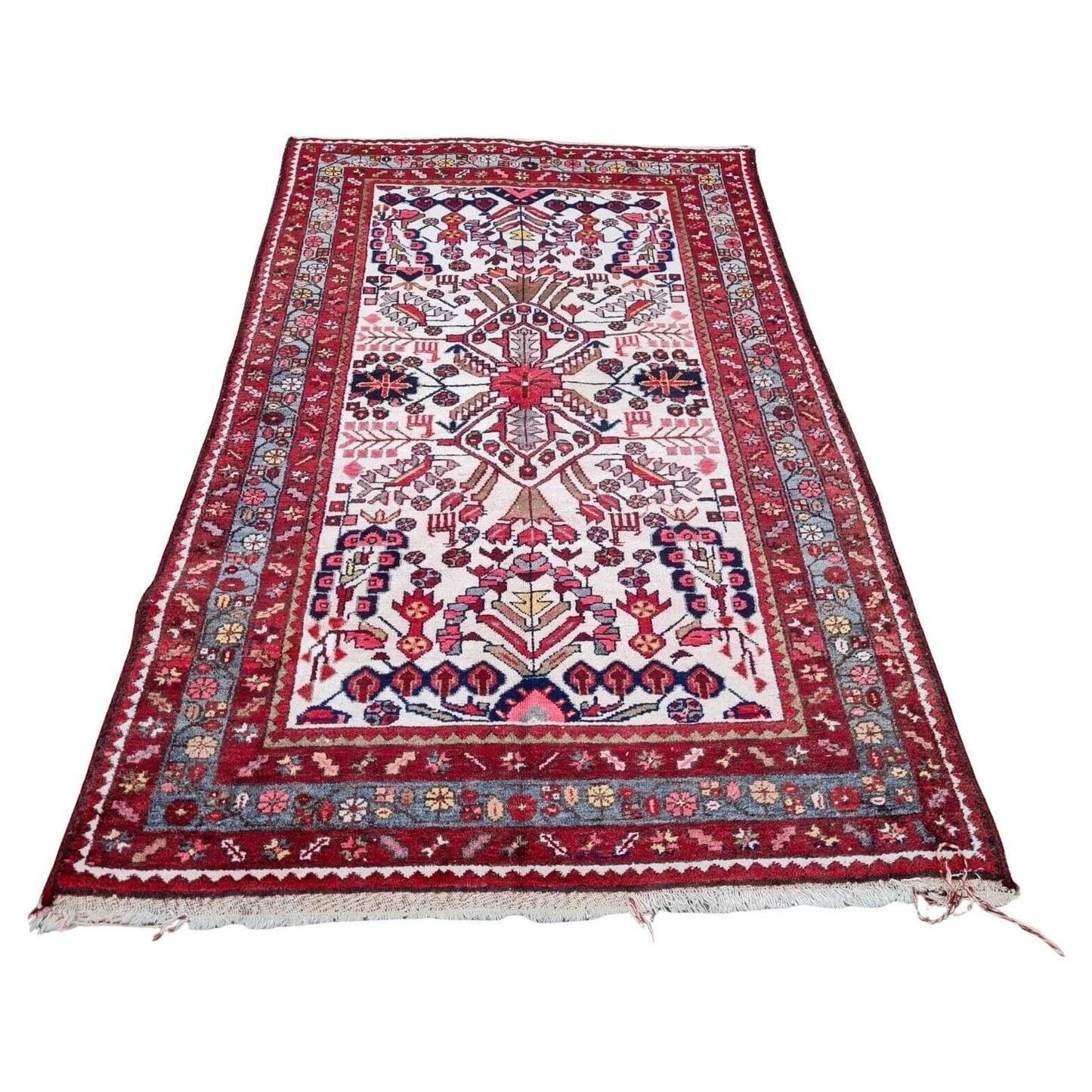 handmade antique Persian Hamadan rug with bold red field
