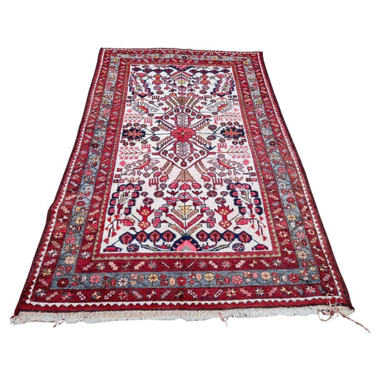handmade antique Persian Hamadan rug with bold red field
