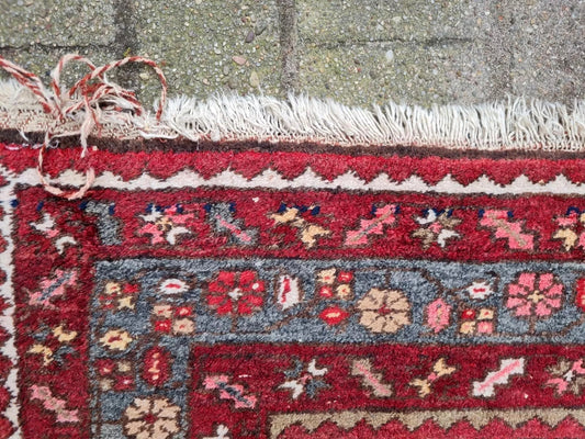 close-up of 1920s Hamadan rug central medallions
