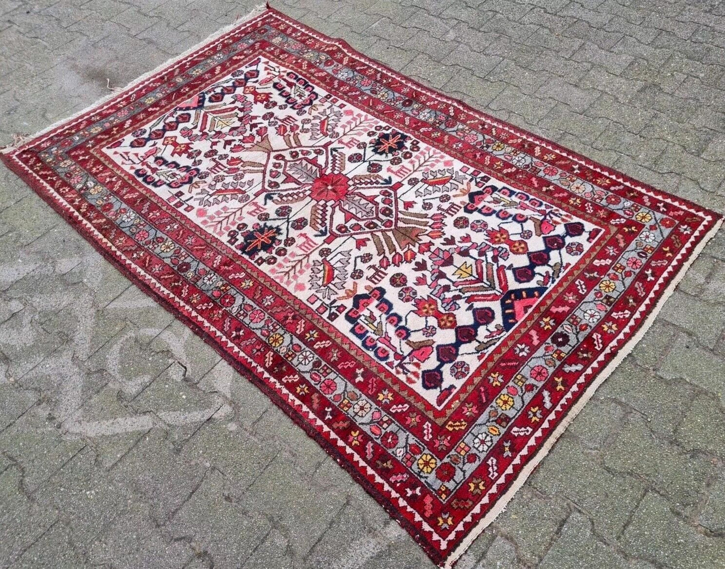 corner detail of Hamadan rug with tribal borders
