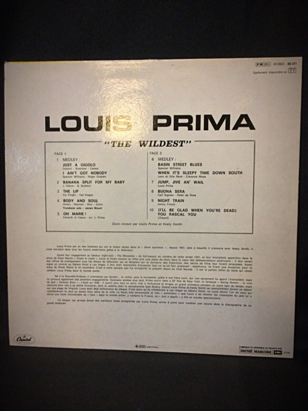 Zoomed-in view of Louis Prima vinyl record label and tracklist
