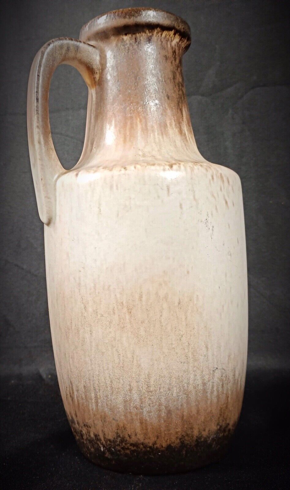 Rustic clay pitcher with handle — classic West German pottery
