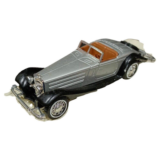 Vintage die-cast model of a Mercedes 540K (1936) in grey.

