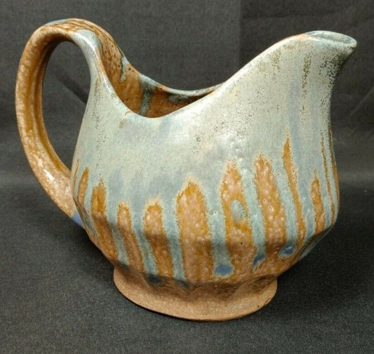 Handcrafted jug showing crackled surface detail

