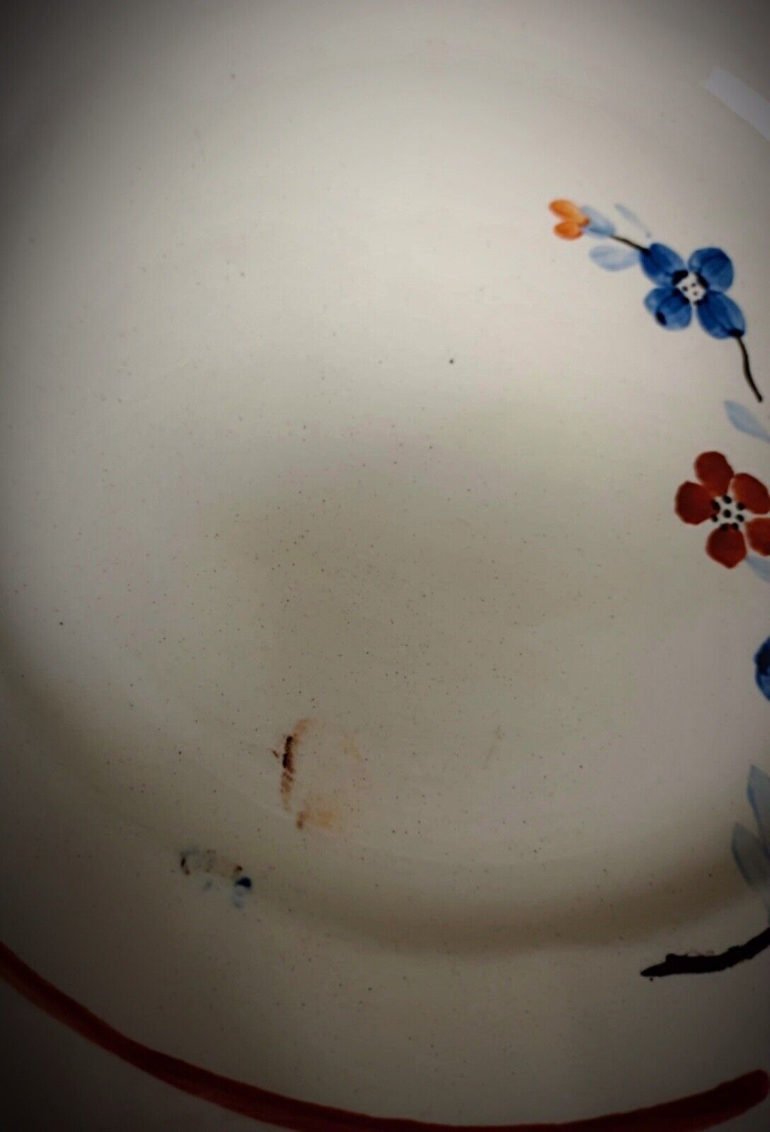 Group display of six floral Sarreguemines dishes

