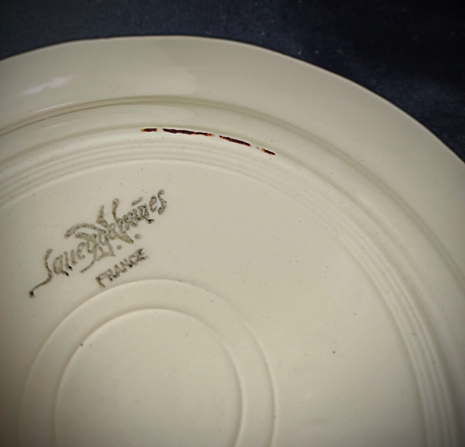 Clean plate surface with hand-painted flower branches

