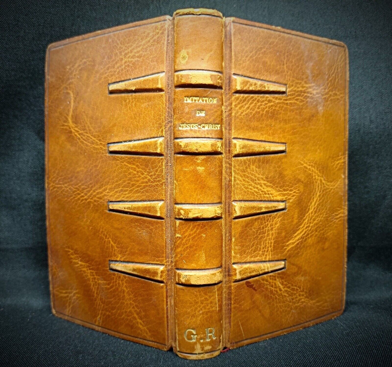 Open page showing yellowed devotional text and soft patina

