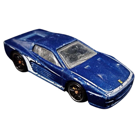 Spectrum Blue 1997 Hot Wheels Ferrari F512M with honest wear
