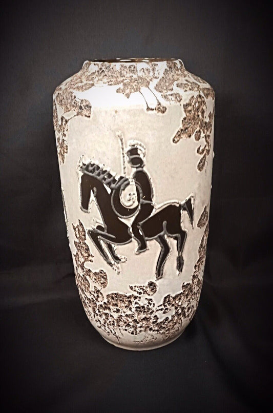 Close-up detail of the knight on horseback motif on the vase's surface.

