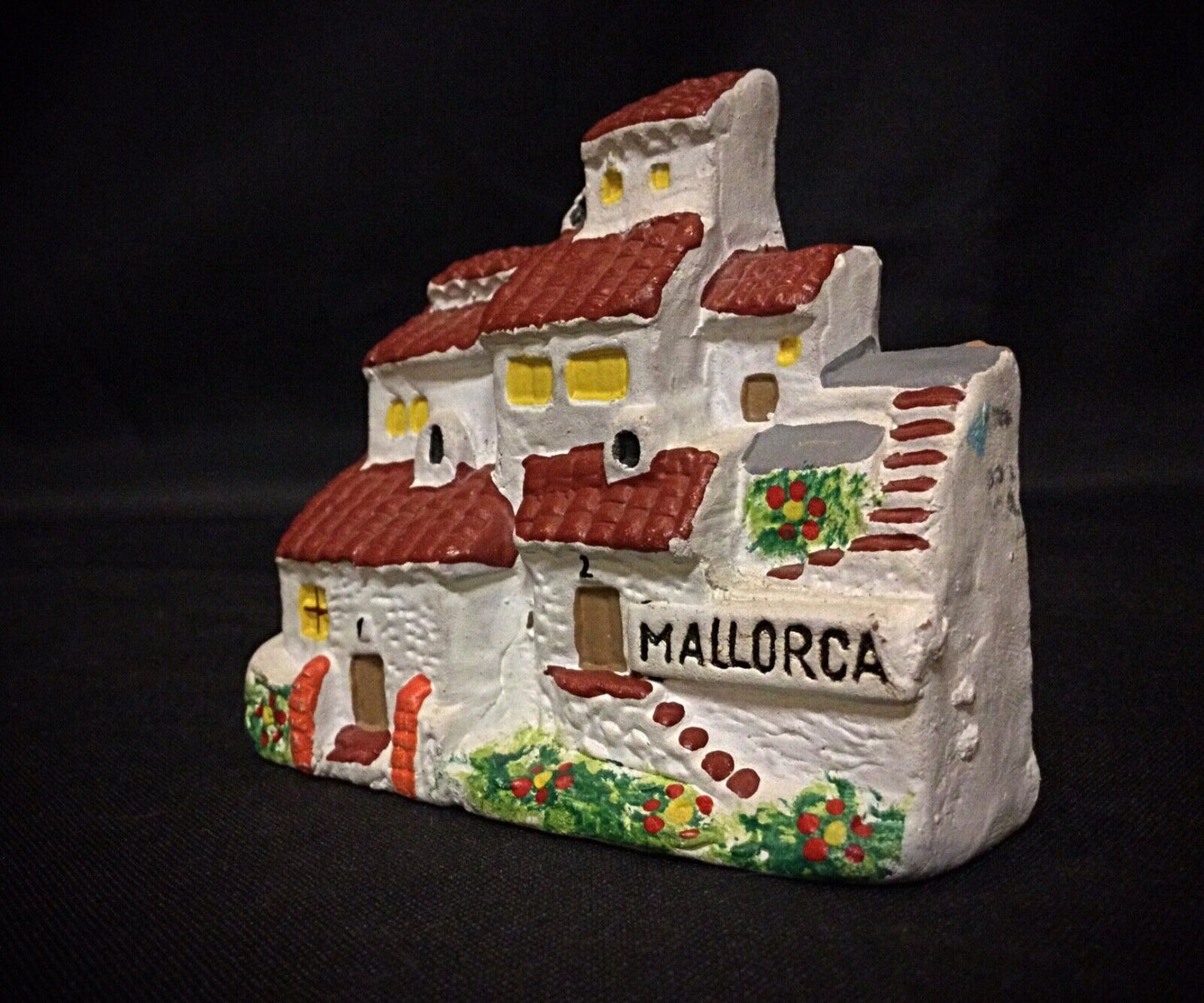 Side view of Mallorca plaster house figurine
