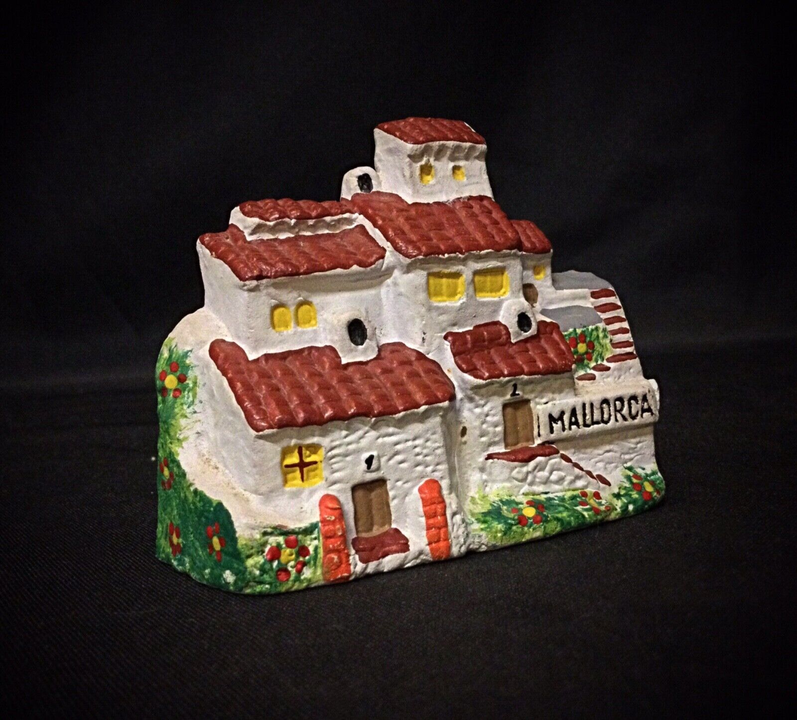 Colorful Mallorcan house miniature, hand-painted detail
