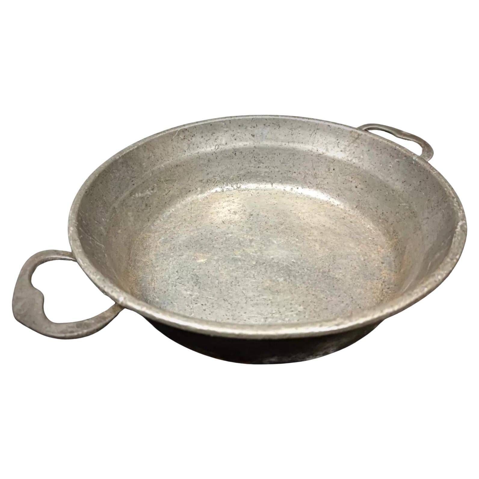 19th century pewter plate with handle front view

